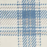 Close-up of Nourison Grafix Ivory Blue Farmhouse rug showing a plaid pattern in ivory, blue, and gray. Soft texture.