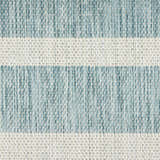 Close-up of the Nourison Positano Aqua Ivory rug, showing woven texture and stripe detail.