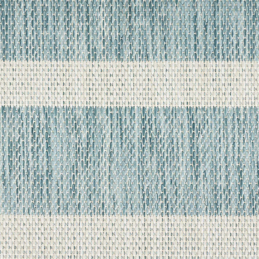 Close-up of the Nourison Positano Aqua Ivory rug, showing woven texture and stripe detail.