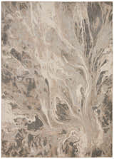 Close-up of Inspire Me! Home Decor Elegance Grey rug. Abstract, swirling gray, beige, and cream pattern. Soft texture.