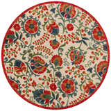 Close-up of Nourison Aloha Red Multicolor Farmhouse Area Rug, round shape, with floral pattern in red, blue, orange, and green.