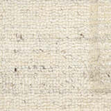 Close-up of the Calvin Klein CK082 Ridge Ivory rug. Shows the wool texture and handmade construction. Chestnut color accents.