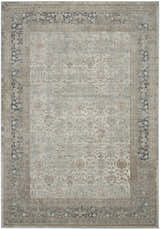 Close-up of Nourison Malta Cloud Vintage Area Rug; cloud, blue and brown floral pattern with a vintage style.