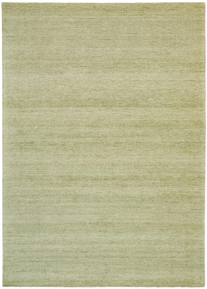 Close-up of the texture and color of the Nourison Weston Citron area rug. Modern, bamboo-silk like fiber rug in light green.