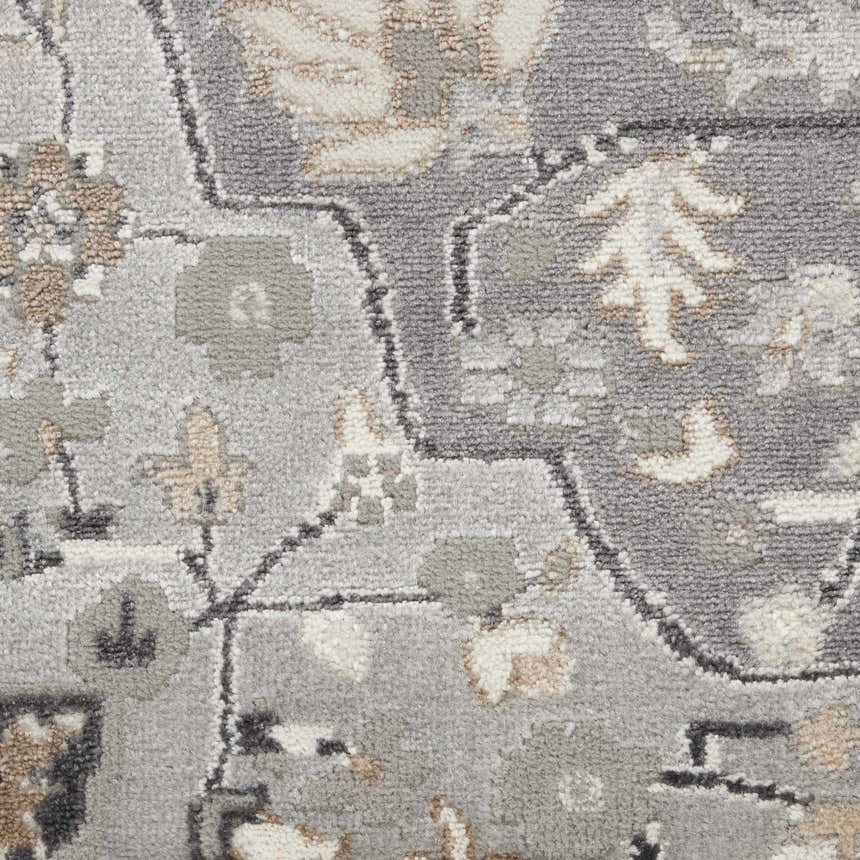 Close-up of the Nourison Elation Ivory Grey rug showing its transitional pattern, high pile texture and chestnut accents.