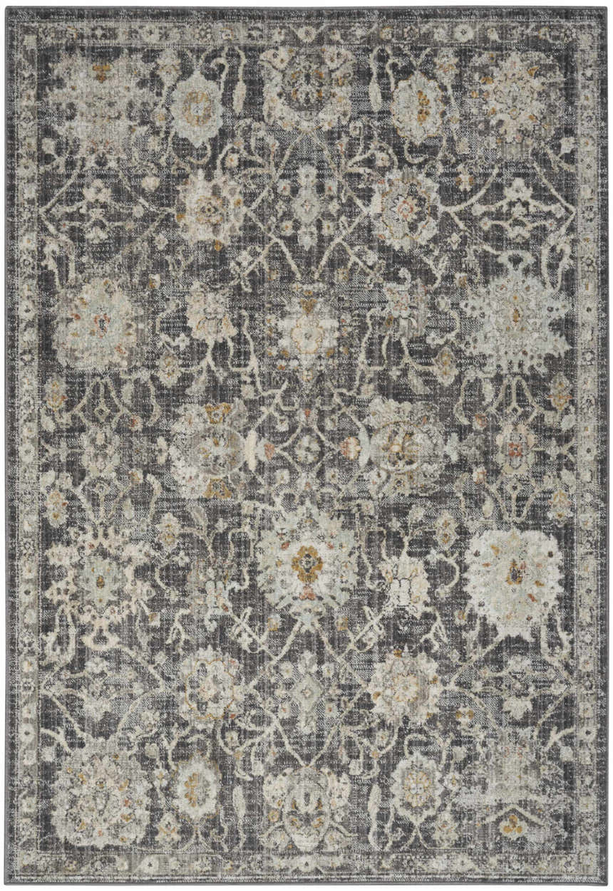 Close-up of Nourison Oushak Home Charcoal Vintage Area Rug. Features floral taupe pattern on a dark gray background.