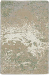 Close-up of the Nourison Twilight Ivory Green rug, featuring a chestnut, ivory, and green abstract pattern.