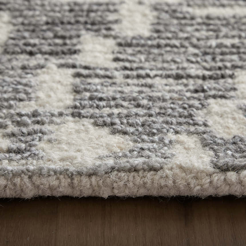 Close-up of the texture and design of the Feizy Asher Gray and White transitional rug. Pile