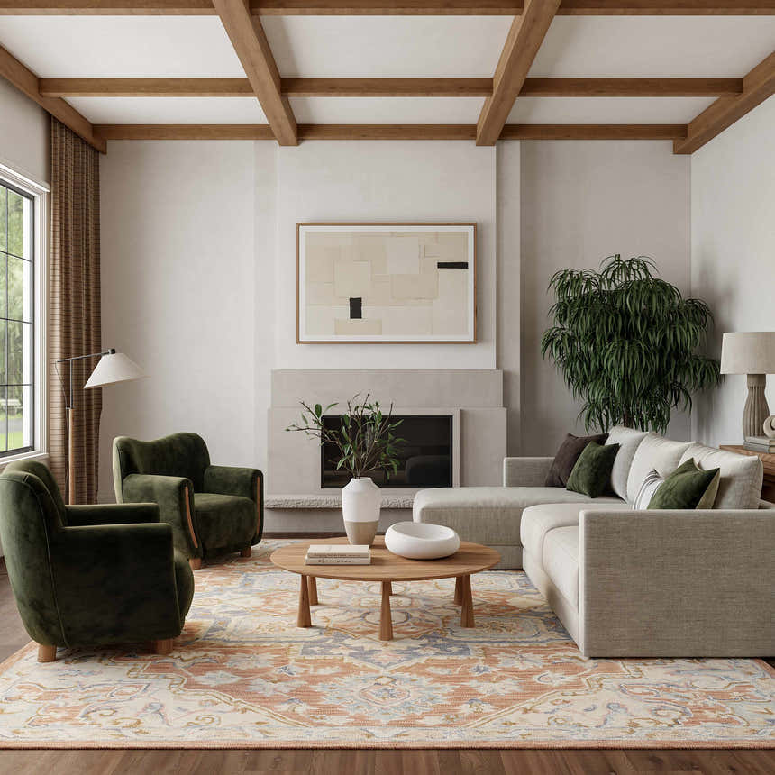 Living room with green chairs and Nourison Maison Rust Ivory Vintage Area Rug.