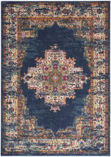 Close-up of the Nourison Passion Navy Vintage Area Rug, featuring a detailed floral pattern and distressed texture.