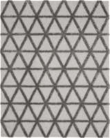 Close-up of the Nourison Highlands Grey Modern Indoor Area Rug with a geometric triangle pattern.