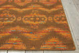 Close up of Nourison Spectrum Flame Chocolate rug showing bamboo silk-like fiber, cotton, and wool texture.