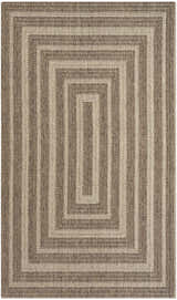 Close-up of the Nourison Tulum Brown Outdoor Area Rug showing its concentric rectangle pattern and textured weave.