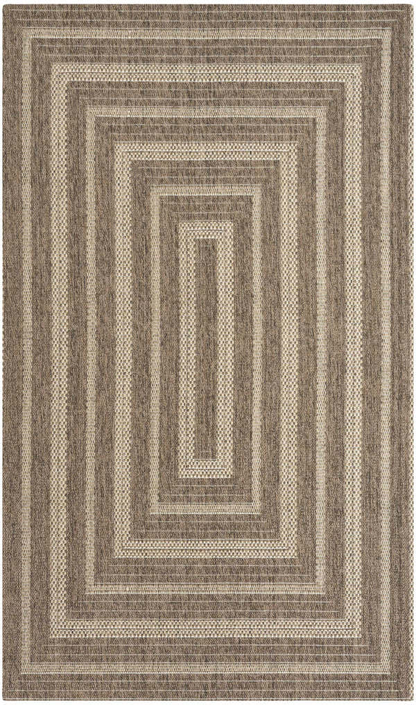 Close-up of the Nourison Tulum Brown Outdoor Area Rug showing its concentric rectangle pattern and textured weave.