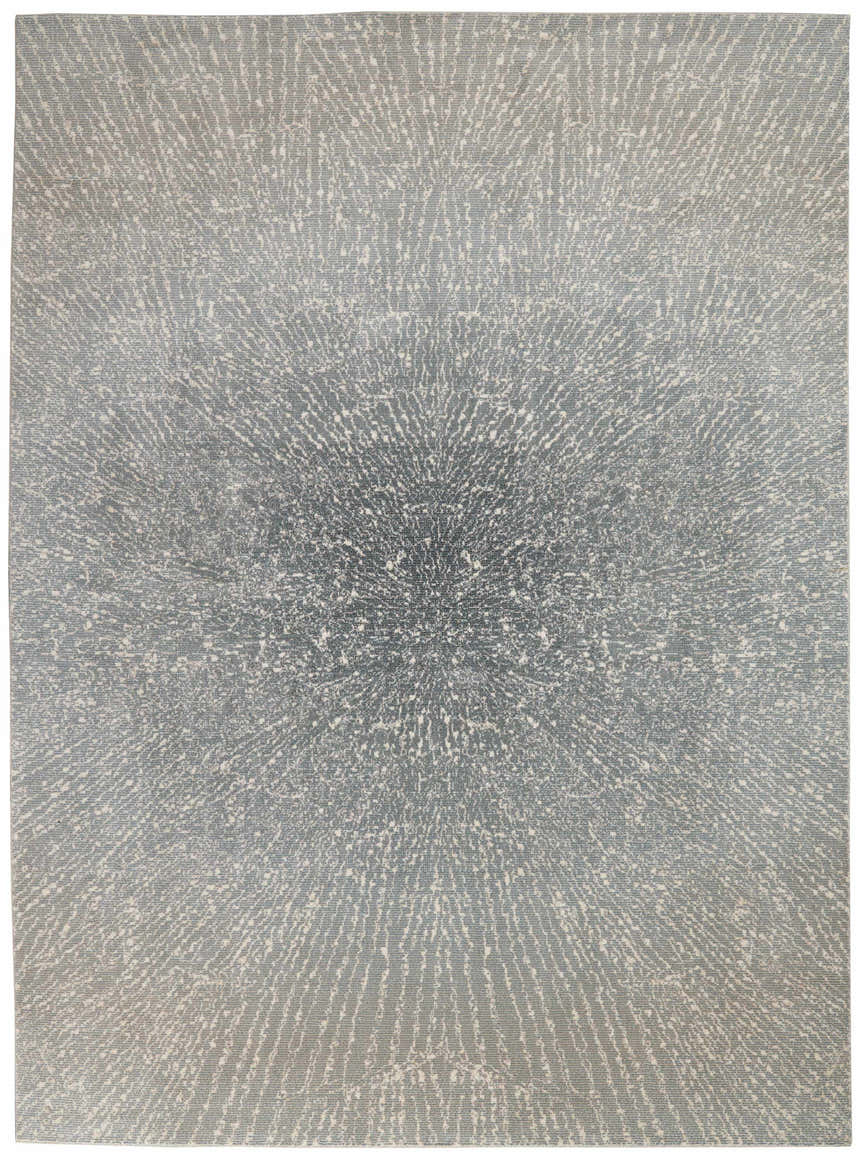Close-up of Elegance Grey Modern Indoor Area Rug. Mid-century style rug with a starburst pattern in shades of gray and cream.