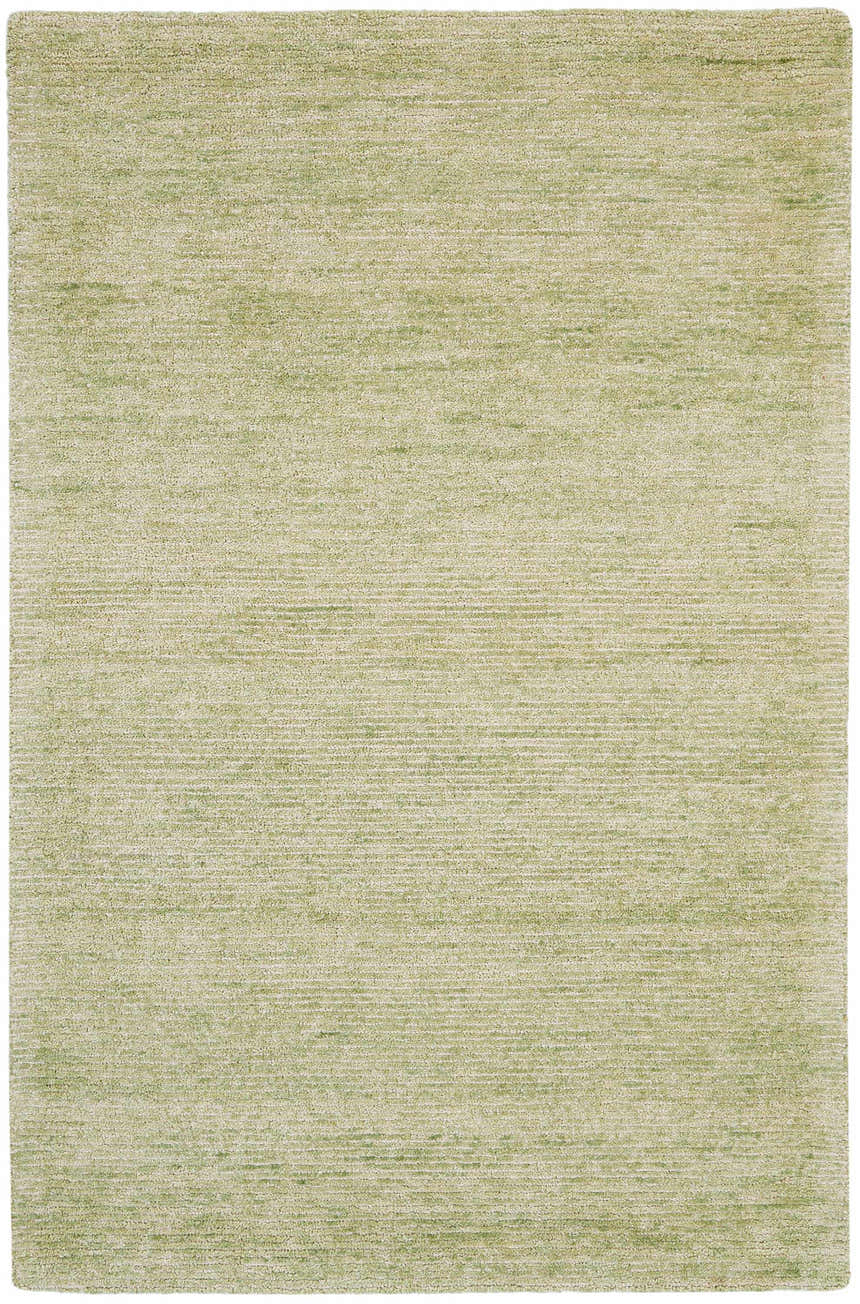 Close-up of the Nourison Weston Citron Rug. The handmade rug has a subtle horizontal pattern and soft, silk-like texture.