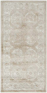 Close-up of the Nourison Dekor Cream Beige vintage rug, showcasing its high pile texture and subtle, elegant pattern.