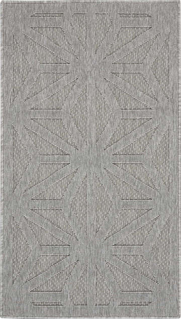 Close-up of the light gray Nourison Cozumel rug, featuring a geometric mid-century modern pattern and subtle texture.
