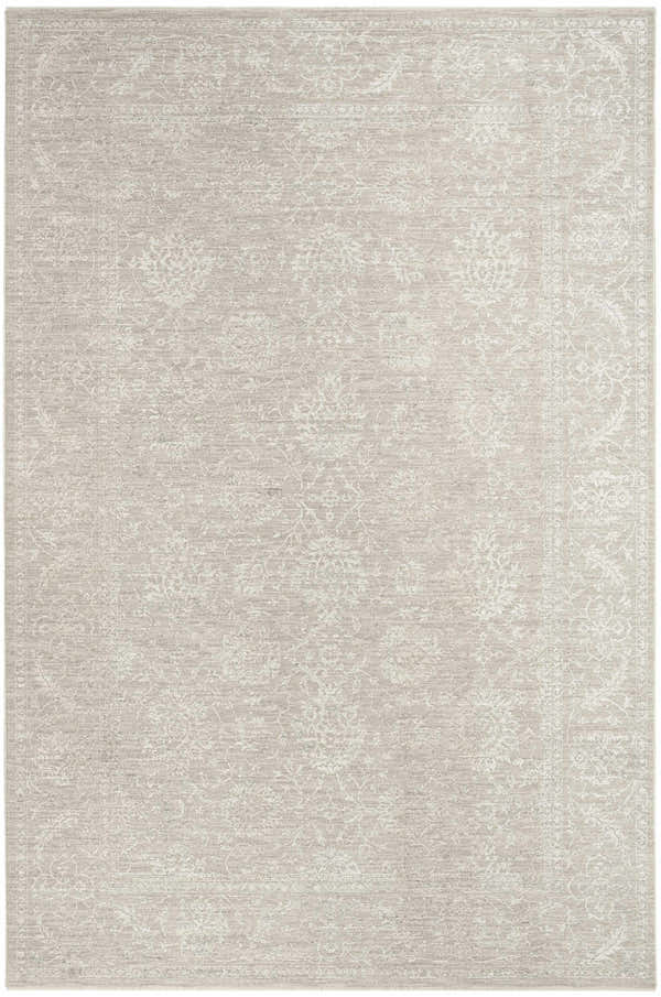 Close-up of the Nourison Moonlit Ivory Grey Vintage Indoor Area Rug, showing its floral pattern and chestnut color.
