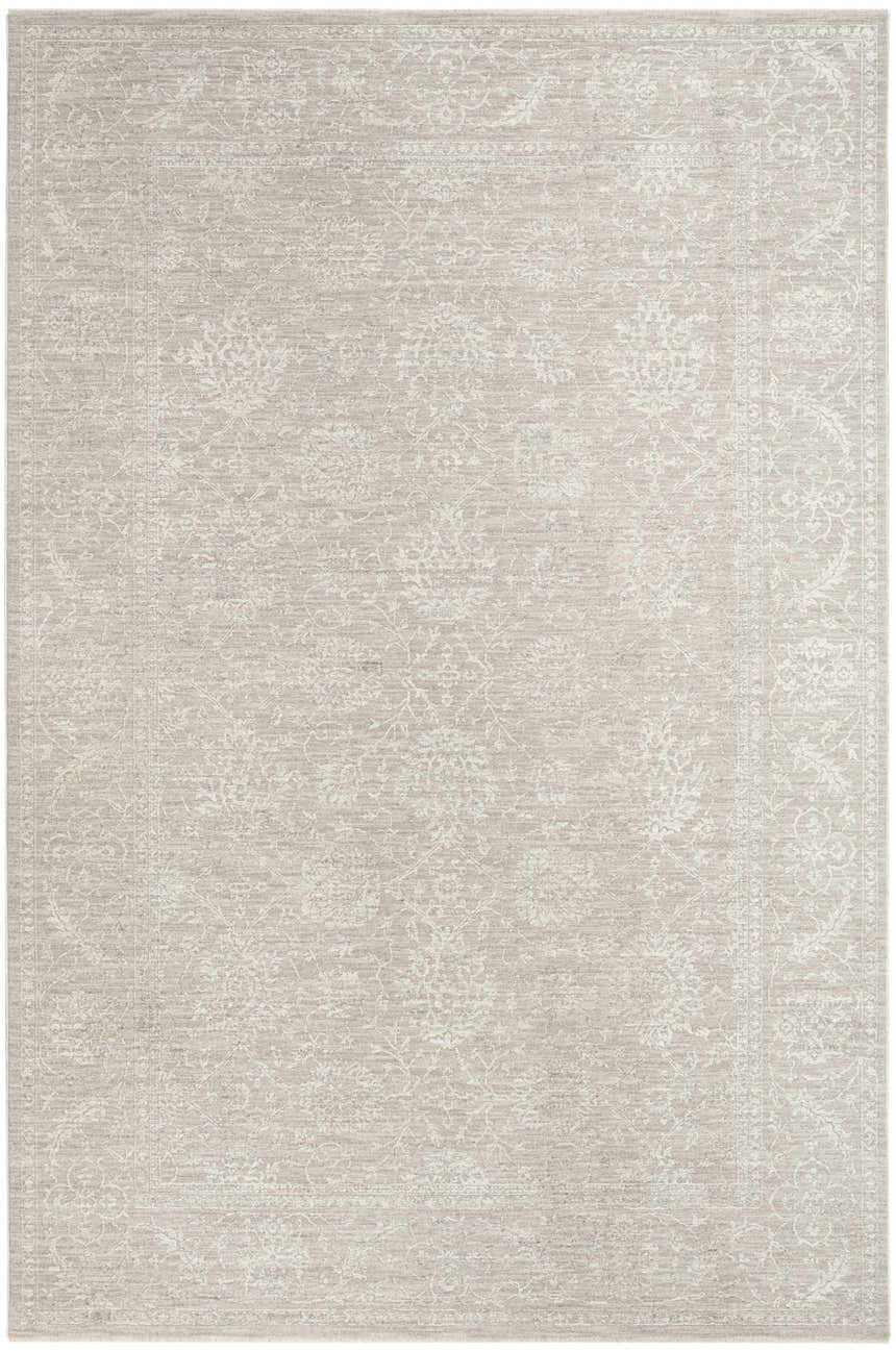 Close-up of the Nourison Moonlit Ivory Grey Vintage Indoor Area Rug, showing its floral pattern and chestnut color.