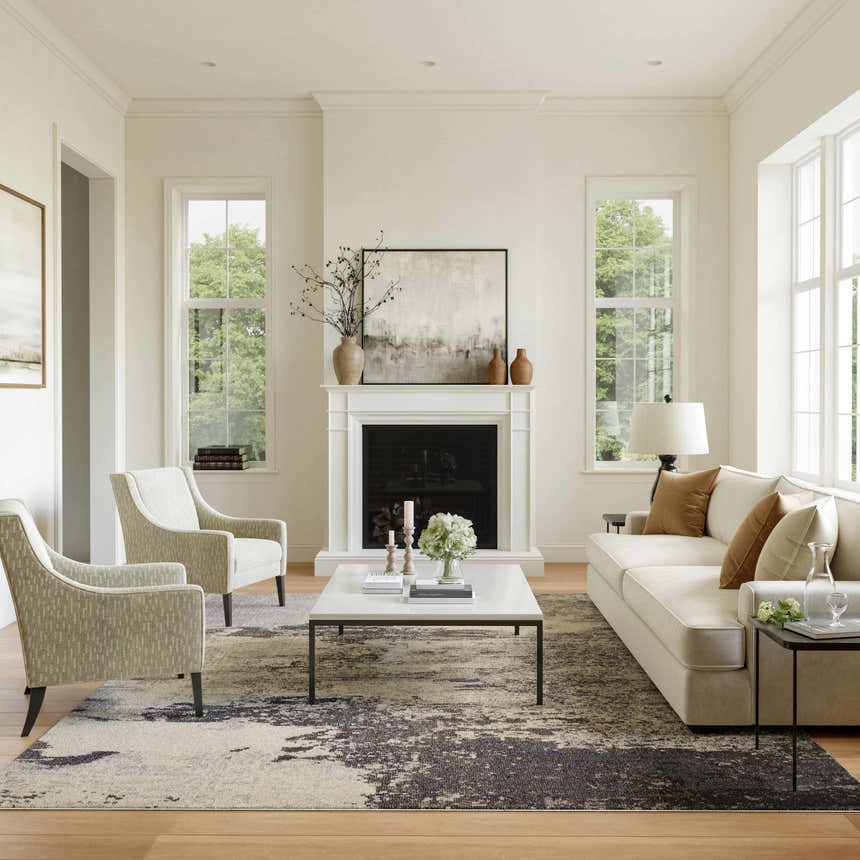 Living room scene with a Nourison Celestial Ivory Grey rug, sofa, chairs, fireplace, and natural light.