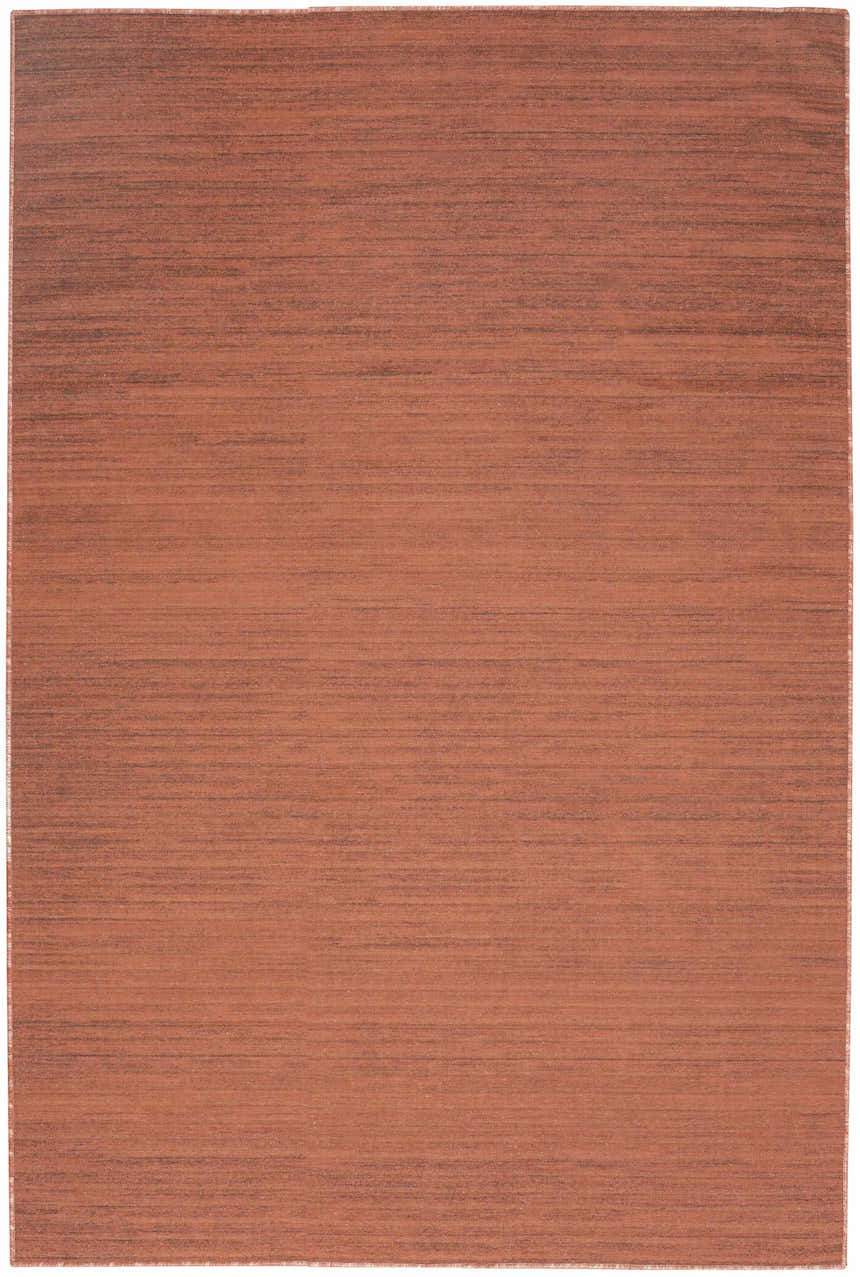 Close-up of the Nourison Essentials Brick Modern Indoor Washable Area Rug, showing its brick red color and subtle horizontal texture.