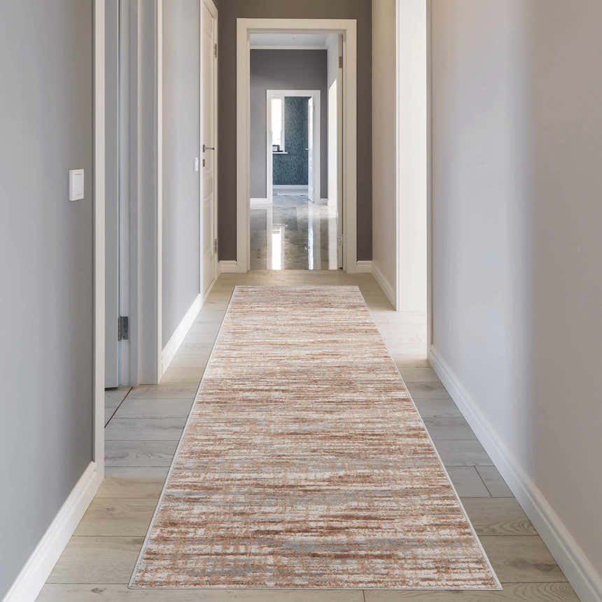 Hallway scene with a Nourison Elation Ivory Grey rug runner on light wood floors and grey walls.