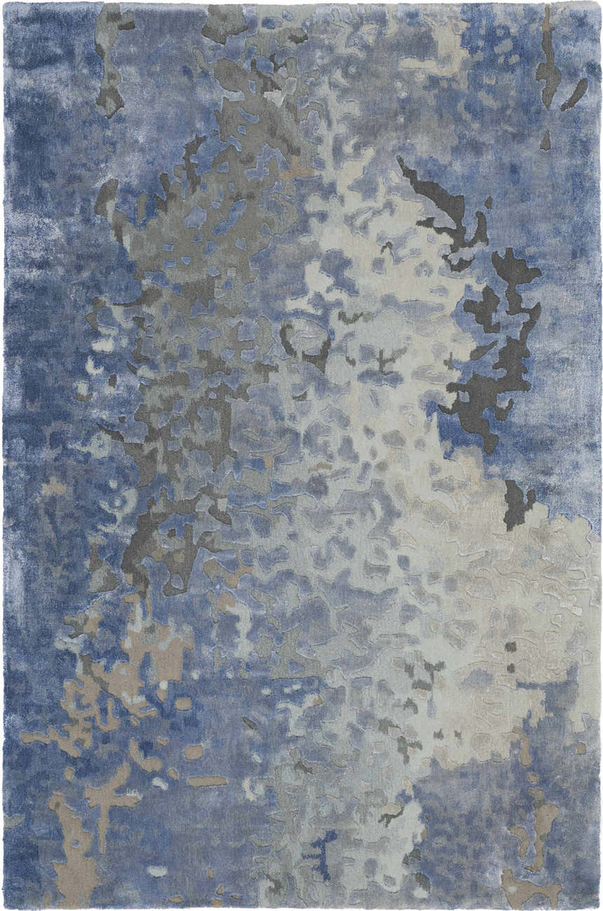 Close-up of the Nourison Prismatic Denim Modern rug. Features an abstract design in shades of blue, gray, and beige.