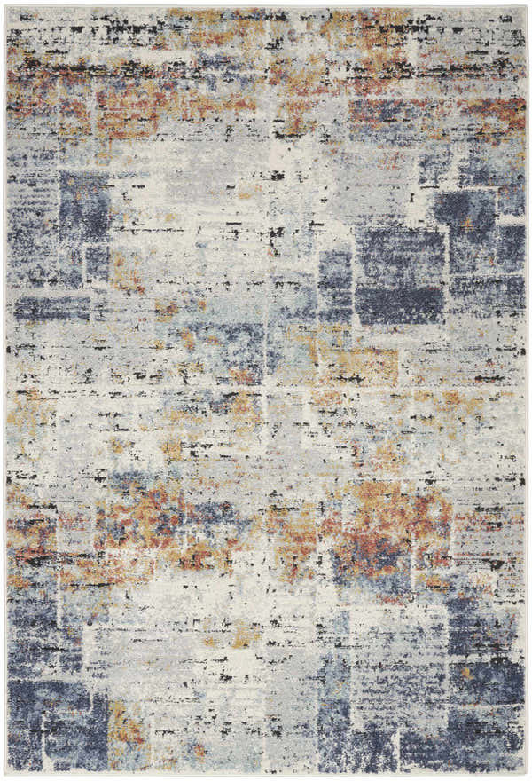 Close-up of Nourison Motion Blue Multicolor rug. Abstract design with blue, orange, and gray tones. Low pile texture.