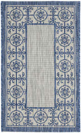 Close-up of Nourison Country Side Ivory Blue Transitional Area Rug with floral medallion border design.