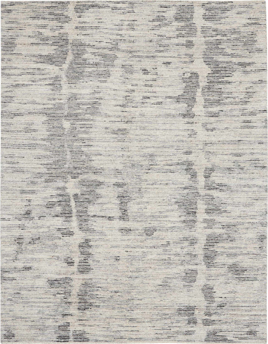 Close-up of the Nourison OCEAN Cream Charcoal rug. Modern design with taupe tones and a subtle linear pattern.