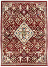 Detailed Nourison Karisma Brick Ivory rug. Farmhouse style with chestnut, ivory, blue, and green tones. Intricate, symmetrical pattern.