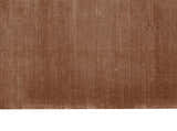 Close-up of the Calvin Klein Home Lunar Foal rug in foal. Features a subtle vertical line pattern and soft, plush texture.