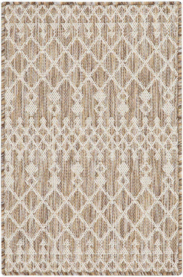 Close-up of the Nourison Positano Beige Area Rug. Features a diamond pattern and textured weave in neutral beige and brown tones.