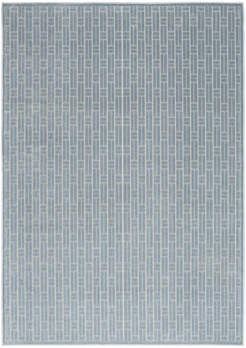 Close-up of Nourison Charm Blue Ivory rug with a modern geometric pattern of rectangles and bars.