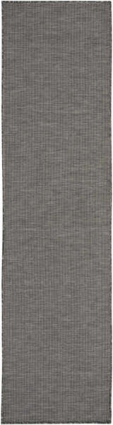 Close-up of the Nourison Positano Charcoal Modern Area Rug showing the taupe color and subtle striped pattern.