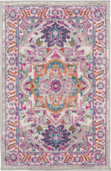 Close-up of the Nourison Passion Light Grey Pink Bohemian Indoor Area Rug with floral and geometric patterns.