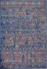 Close-up of the Nourison Ankara Global Navy Multicolor rug. Features a bohemian-inspired pattern with navy, orange, and teal accents.