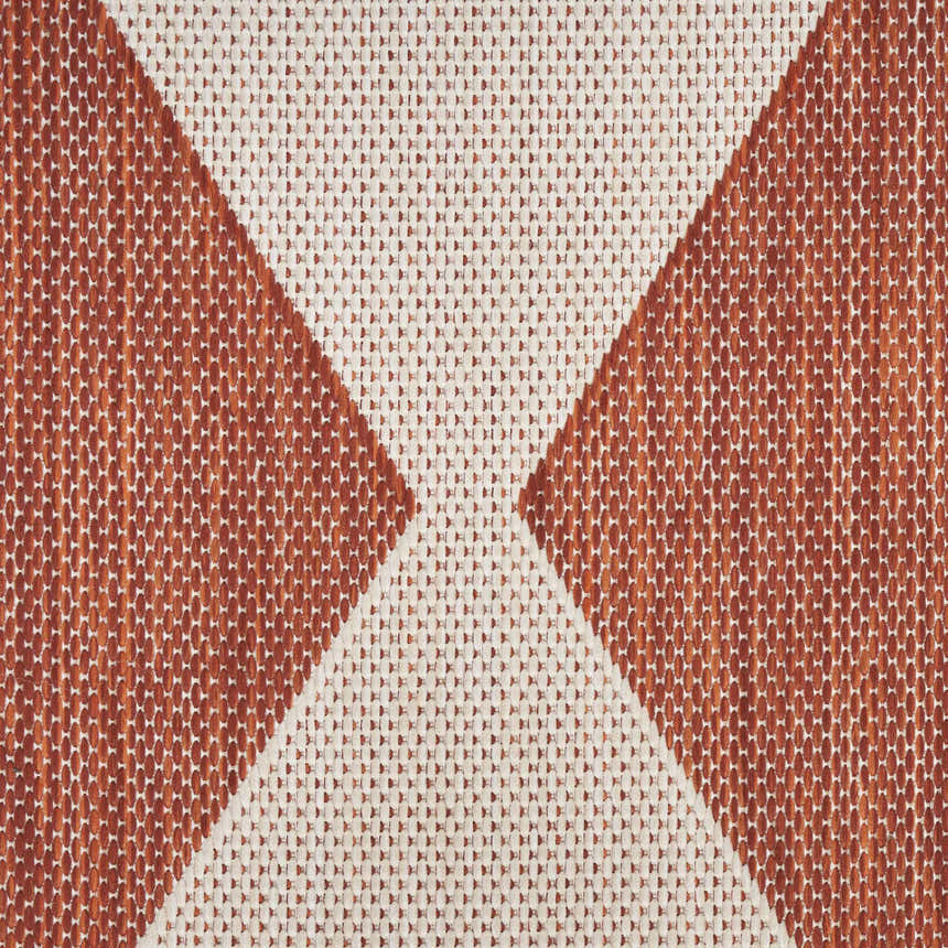 Close-up of the Nourison Positano Terracotta Modern Area Rug featuring a geometric burnt orange and ivory pattern.