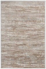 Close-up of the Nourison Elation Ivory Grey rug. High pile texture with chestnut, ivory, and grey modern design.