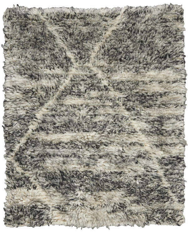 Close-up of the Calvin Klein San Antonio Charcoal Ivory rug. Shag texture with a subtle Moroccan-inspired design.