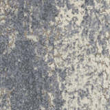 Close-up of the Nourison Sahara Ivory/Slate Rug, showcasing its artistic pattern and texture. Chestnut accents.