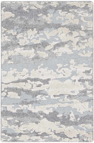 Close-up of the Nourison Divine Aqua rug. Modern design with aqua, gray, and cream abstract pattern. Handmade texture.