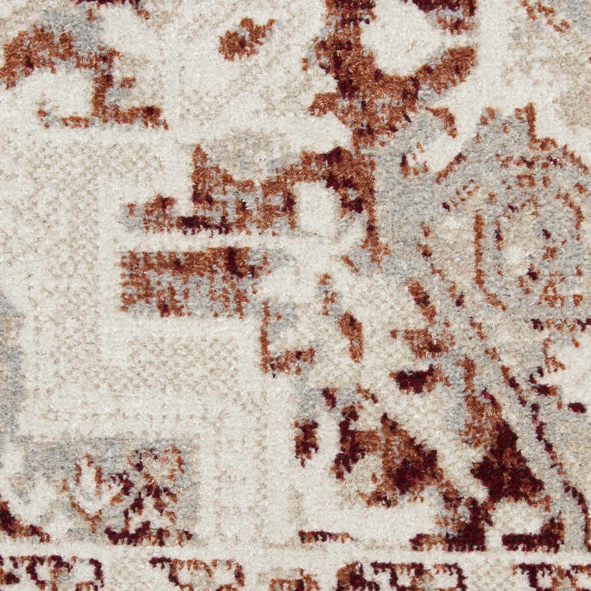 Close-up of the Nourison Carina Brick Silver rug showing its farmhouse style, brick, silver, and cream colors, and machine-made texture.