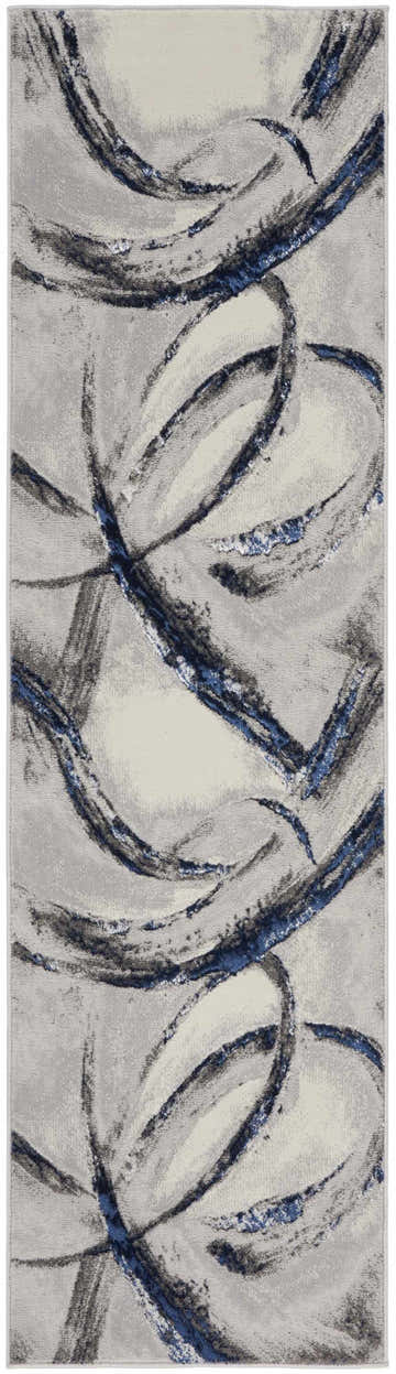 Close-up of the Nourison Splash Grey Navy rug, featuring a modern abstract design with gray and navy brushstrokes.