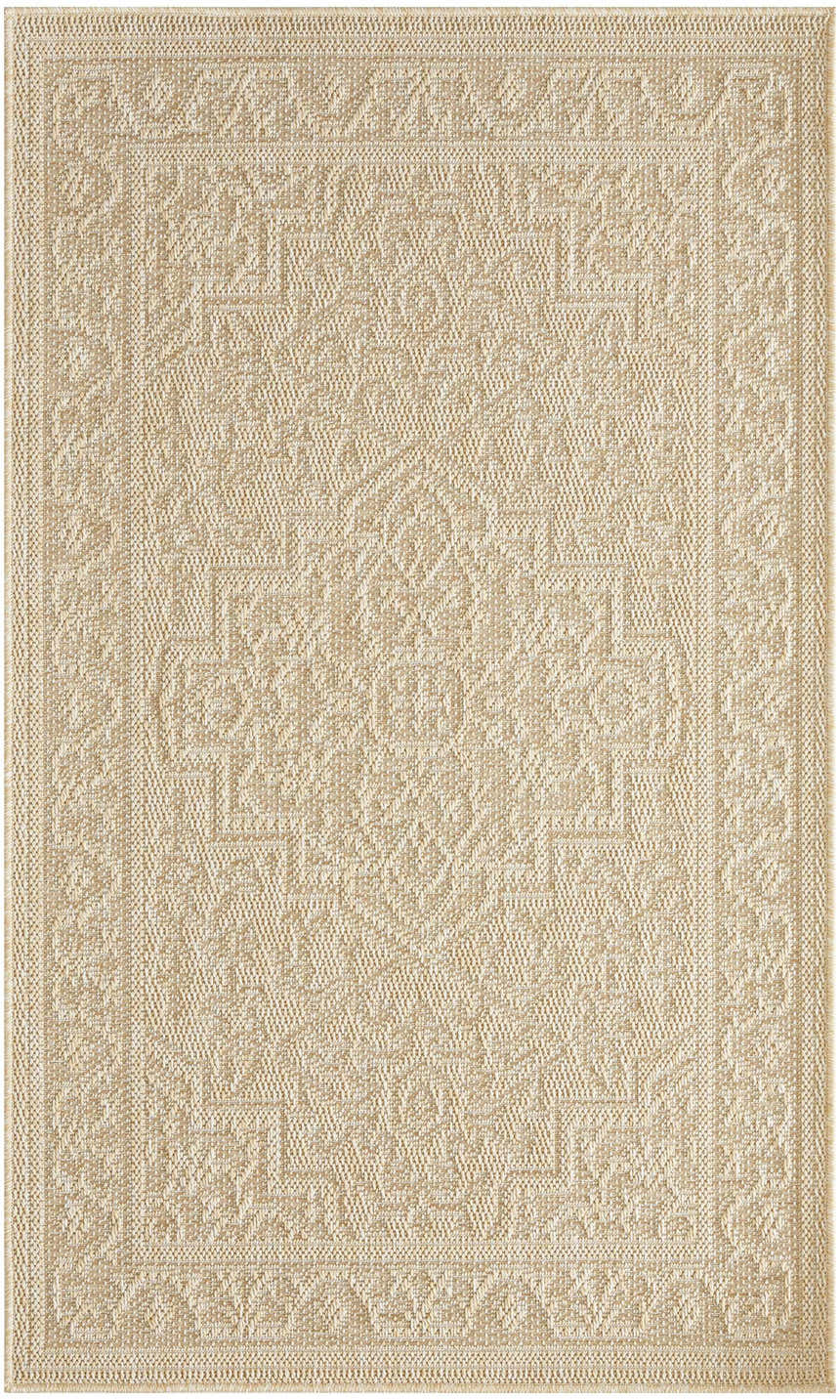 Close-up of the cream Nourison Tulum Outdoor Area Rug, showing the geometric pattern and textured pile.