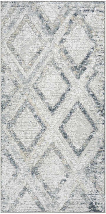 Close-up of the Nourison Dekor Grey Navy rug, showcasing its diamond pattern, high pile texture, and modern design.