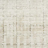 Close up of the DKNY Grand Street rug in ivory and beige with a modern grid pattern.