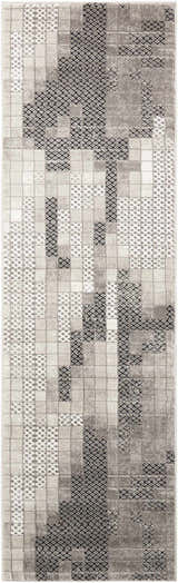 Close-up of the Nourison Soho Grey rug featuring a geometric pattern in shades of gray, black and white.