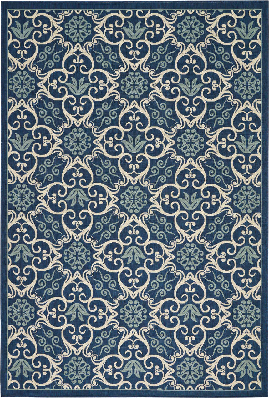 Close-up of the Nourison Caribbean Navy Contemporary Area Rug with a floral and scroll pattern.